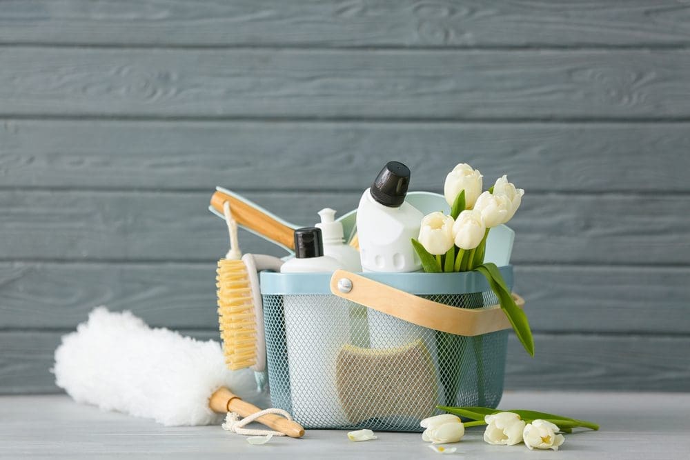 Set,Of,Cleaning,Supplies,And,Spring,Flowers,On,Grey,Wooden