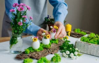 Woman,Preparing,Easter,Decoration,With,Eggs,And,Flowers,Inside,It